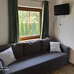 Деревянный коттедж Pod Debami