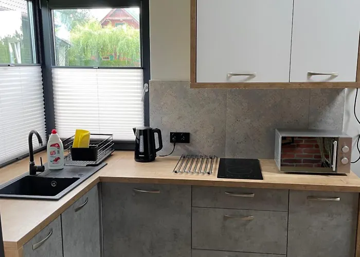 Деревянный коттедж Pod Debami