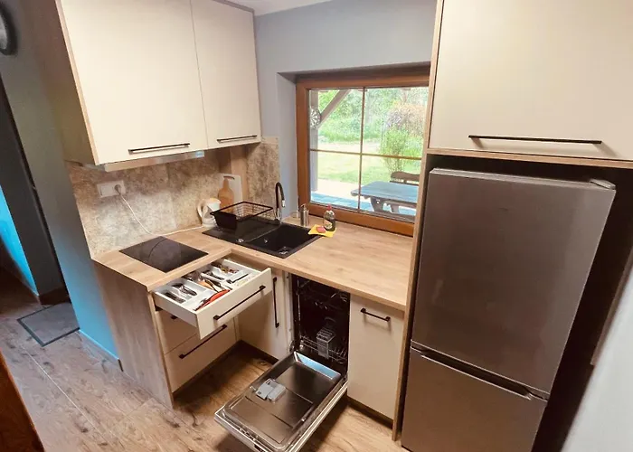 Pod Debami Деревянный коттедж *